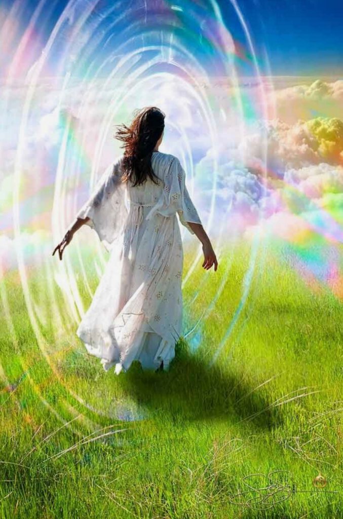 A woman from behind on a field, above the clouds